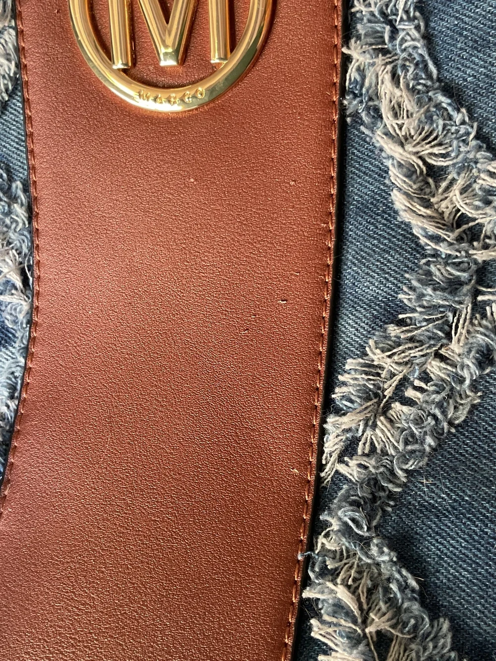 Denim Fringe Quilted Backpack with Brown Trim
